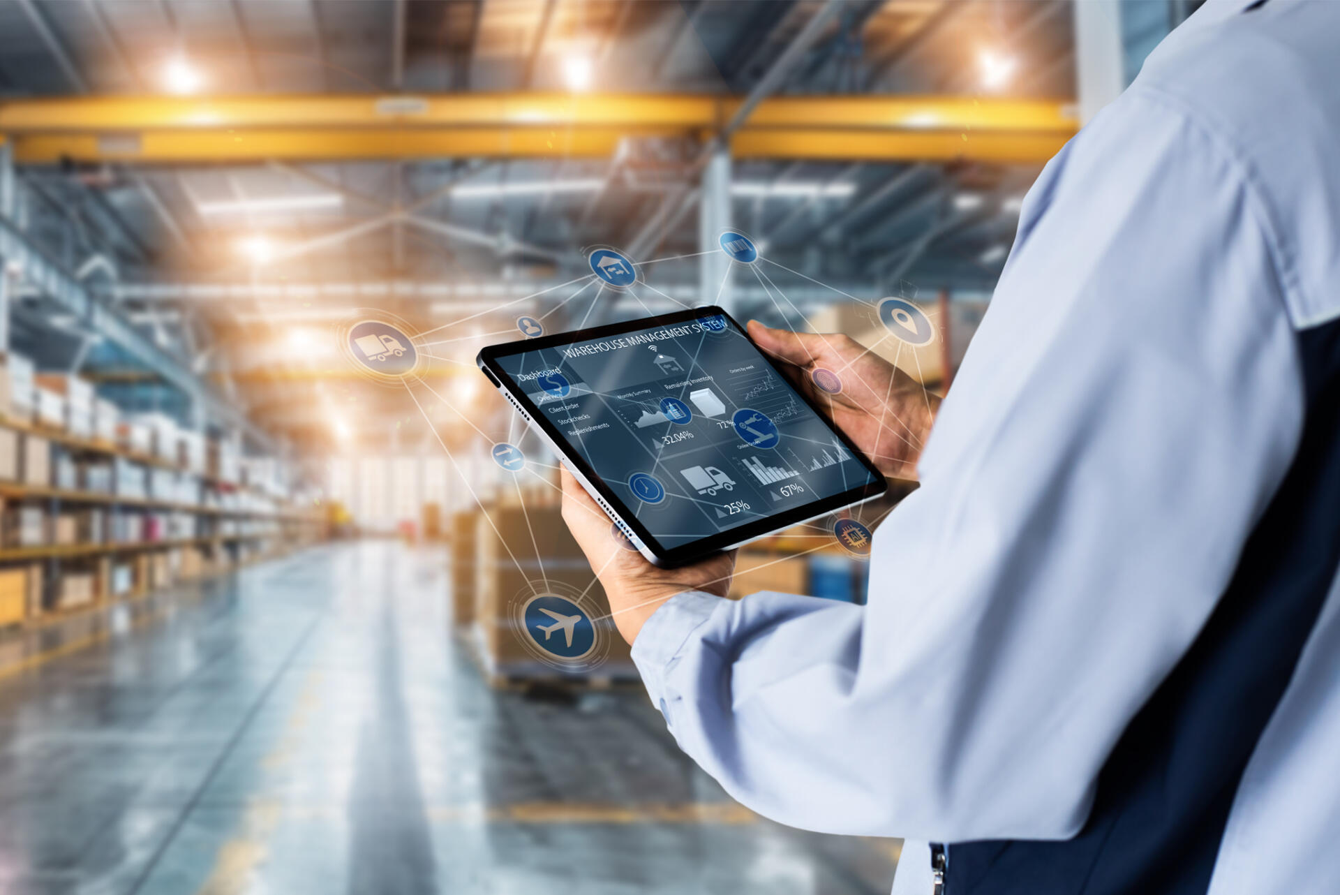 Logistics page inset image_2 Logistics software is used by a man in a warehouse